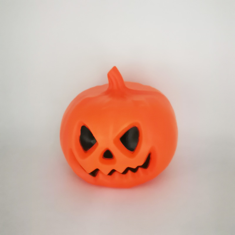 Halloween lighted pumpkin with black eyes